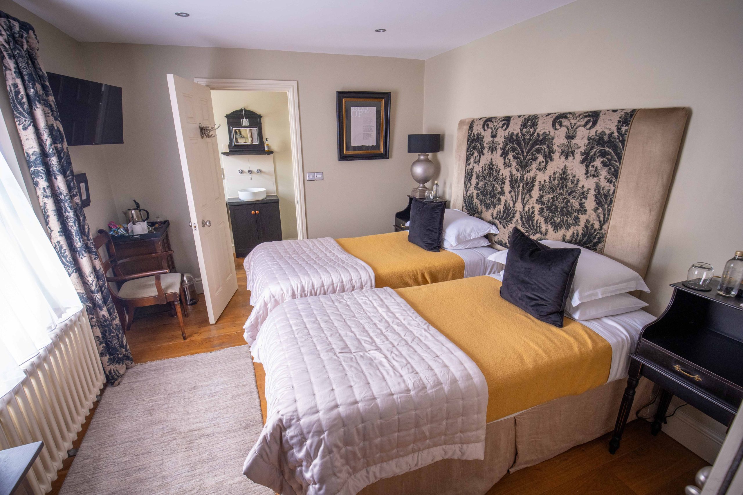a birds eye view of a twin room with 2 good sized beds
