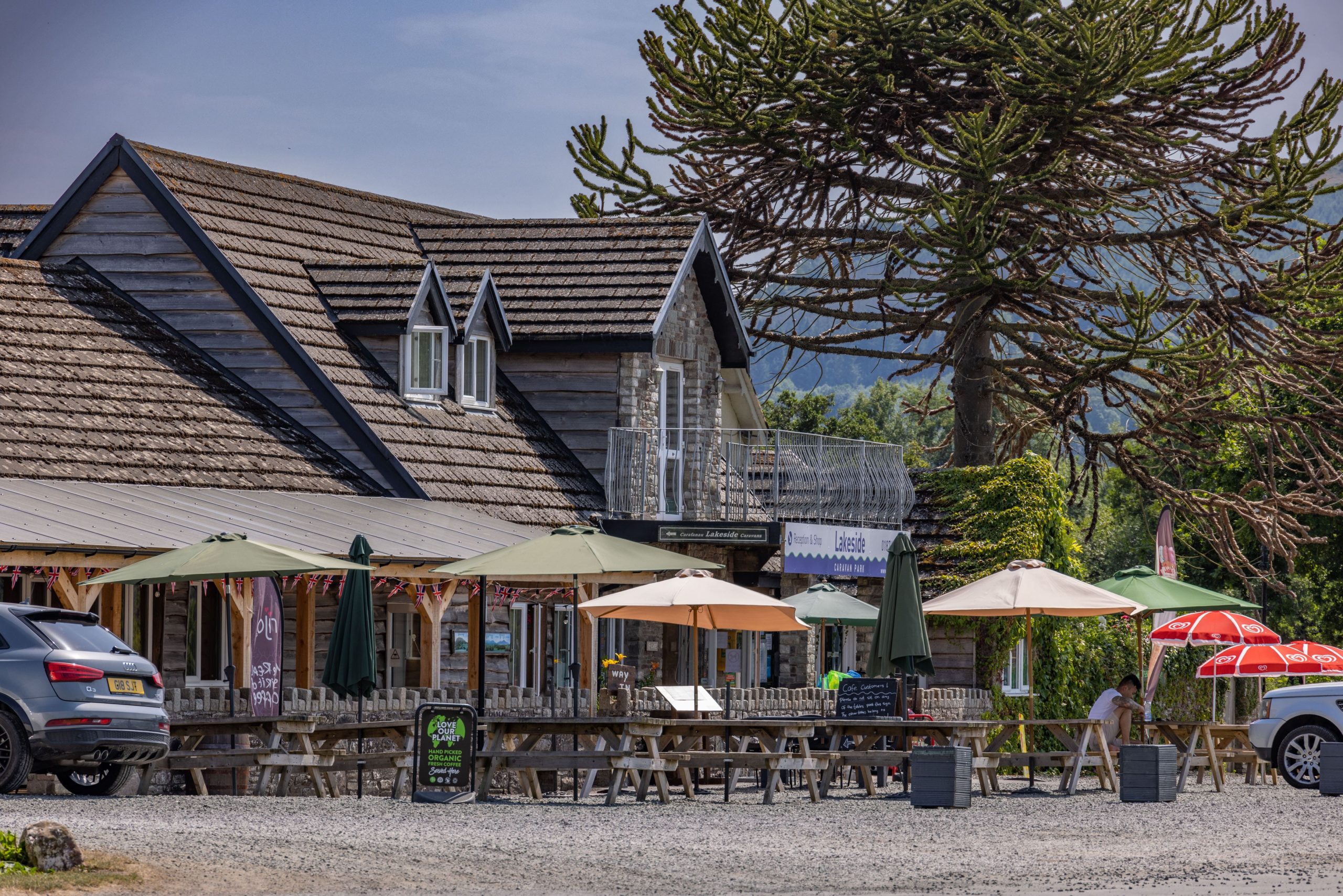 shop and outdoor seated area Lakeside Camping and Caravanning