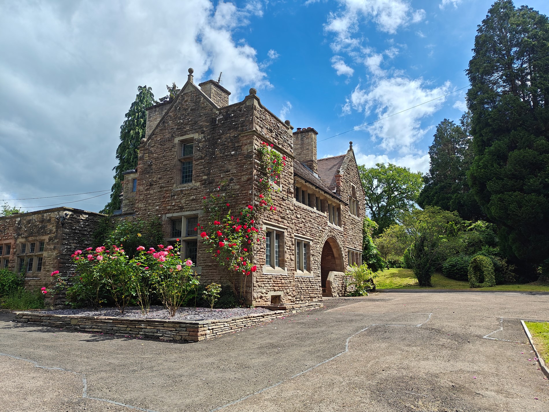 Historic stone country house surrounded by gardens in Bannau Brycheiniog (Brecon Beacons) National Park