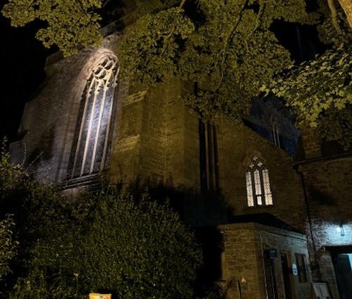 Brecon Cathedral with gentle uplighting at night