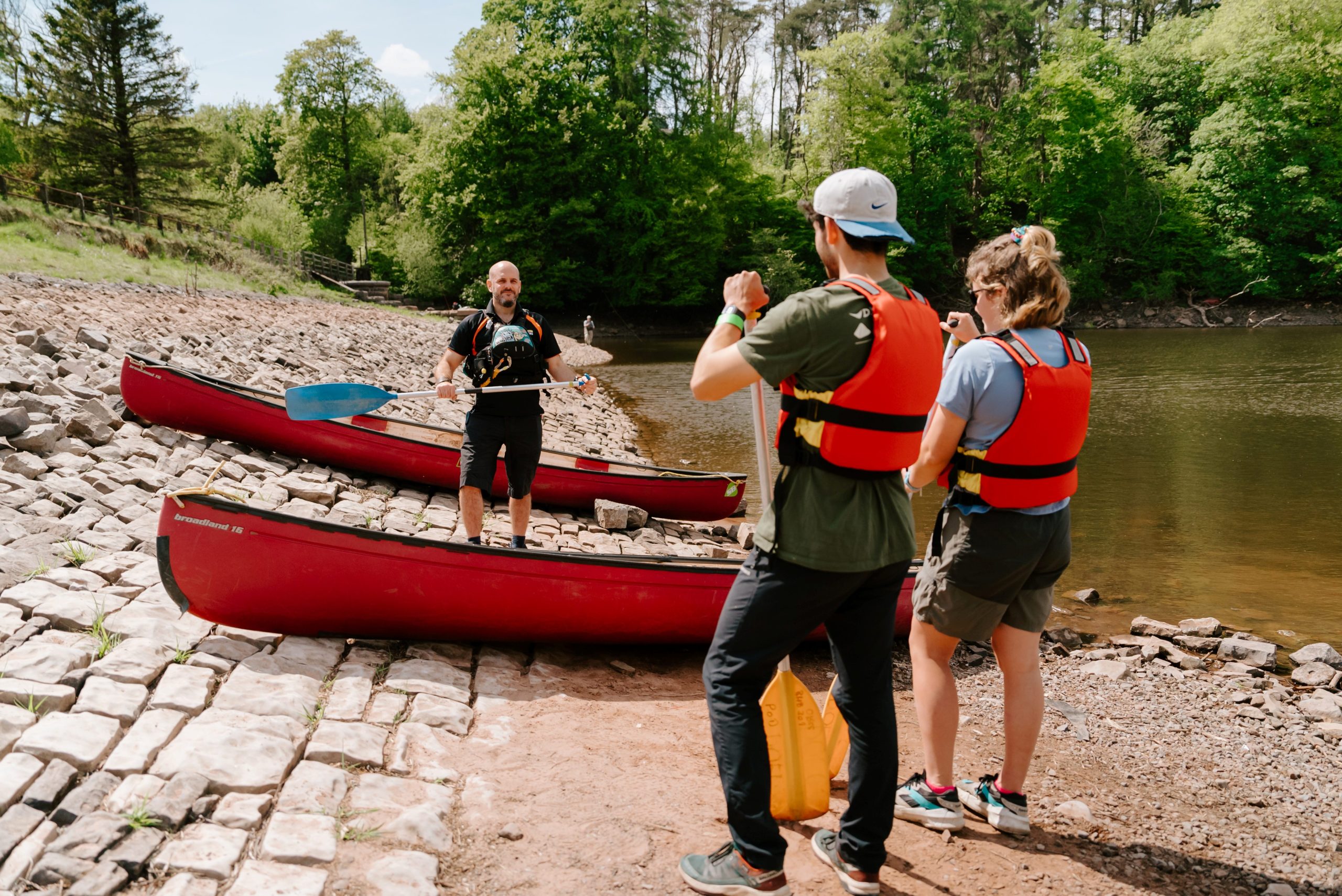 a group of people ready to go out on Canadian Canoes