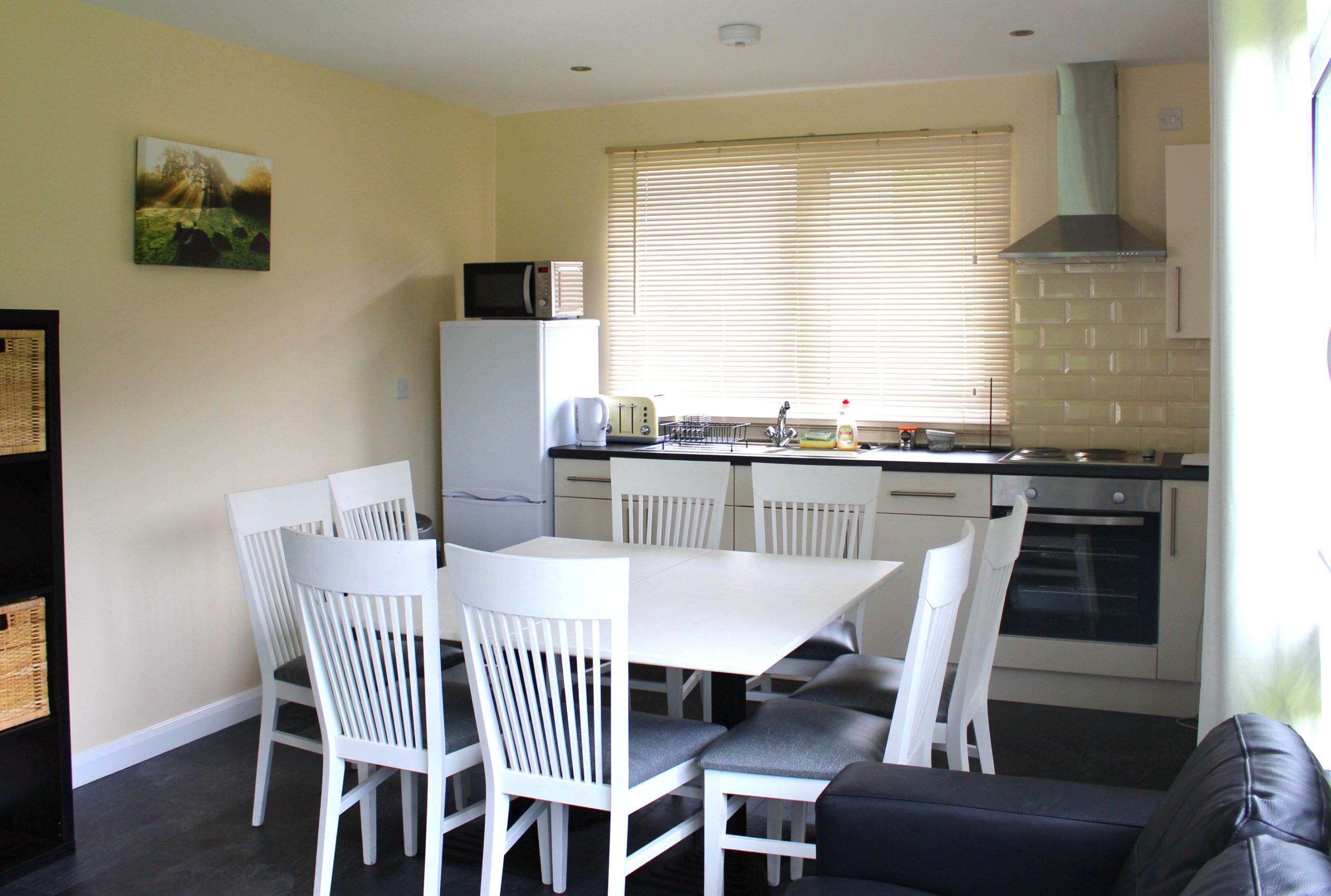 a white kitchen space for a smaller self catering apartment