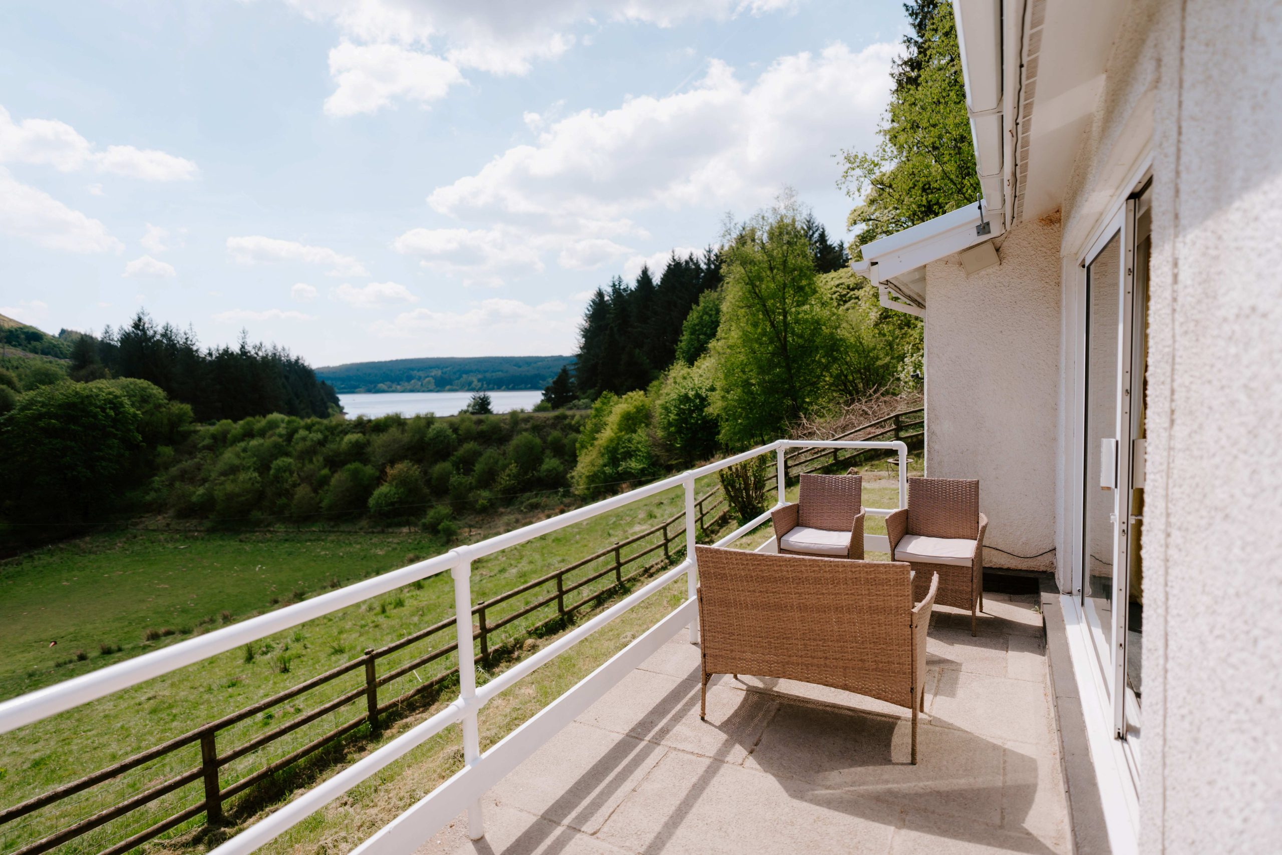 a balcony with views over the reservoir and above a meadow