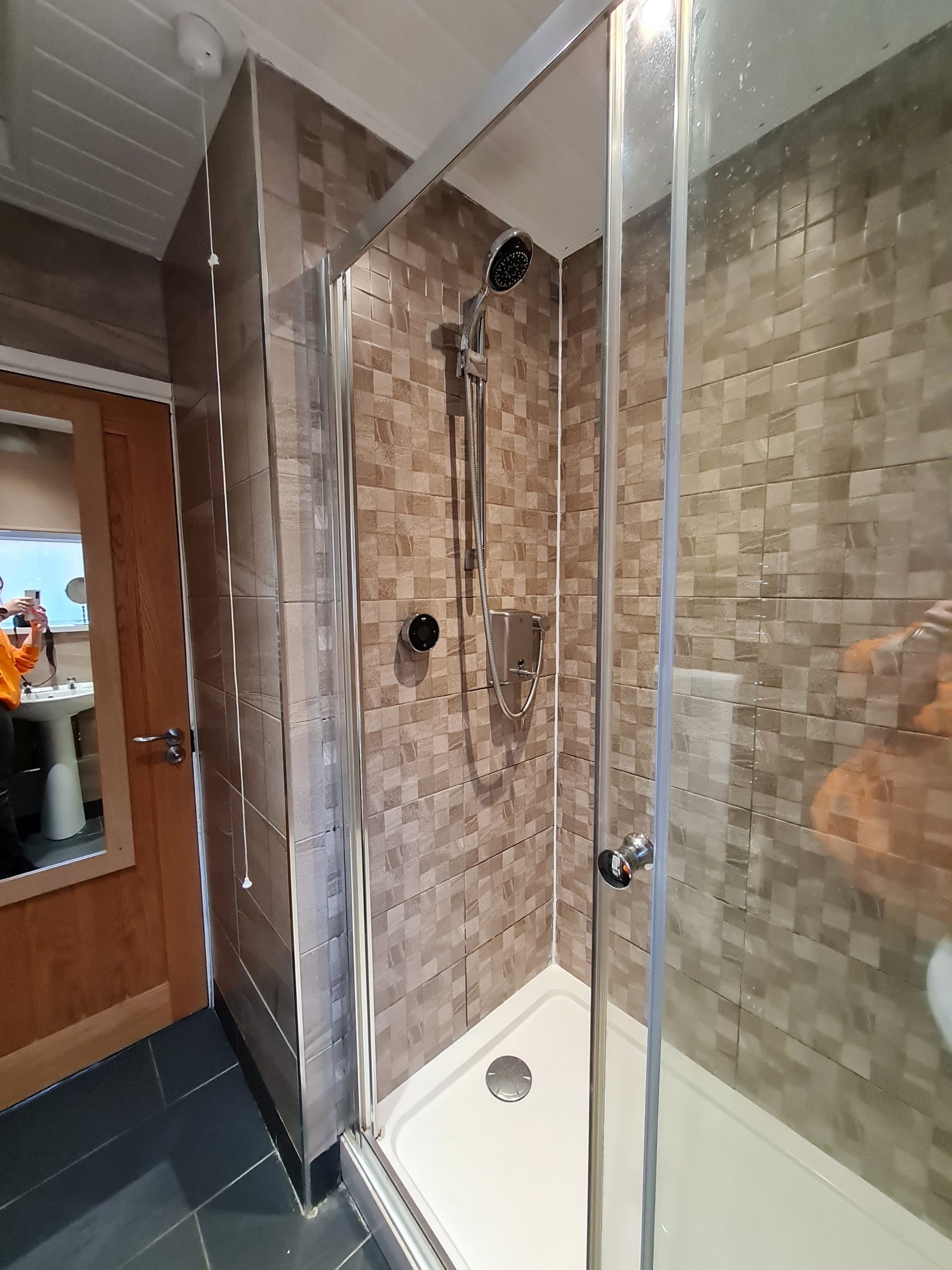 a bathroom with walk in shower