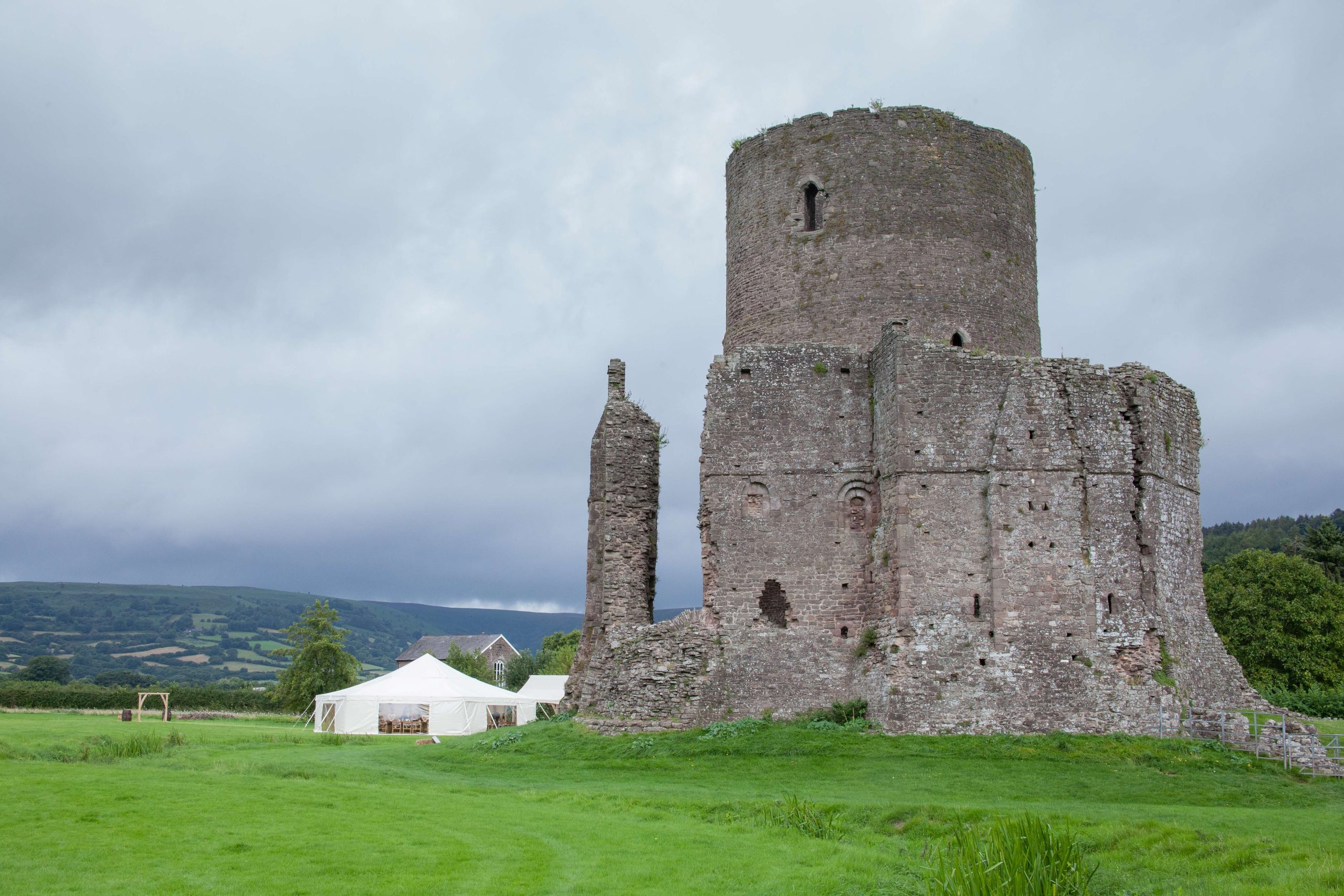 tretower castle ruins and a marquee