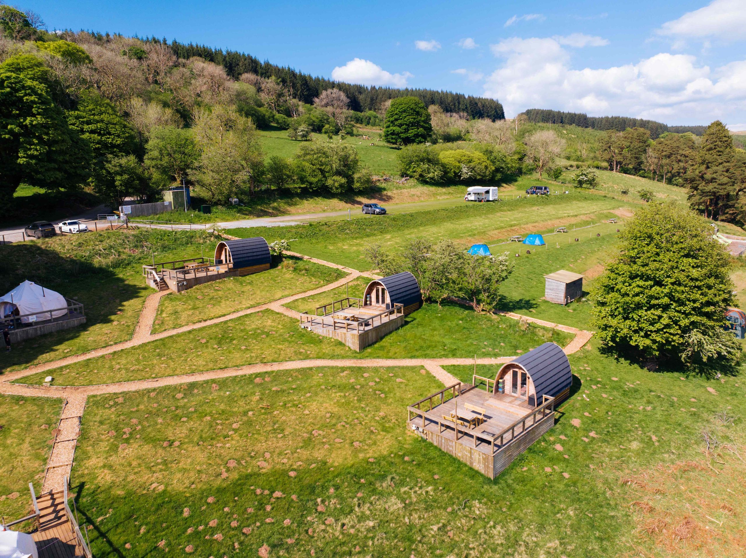 view of the glamping pods and bell tenets area