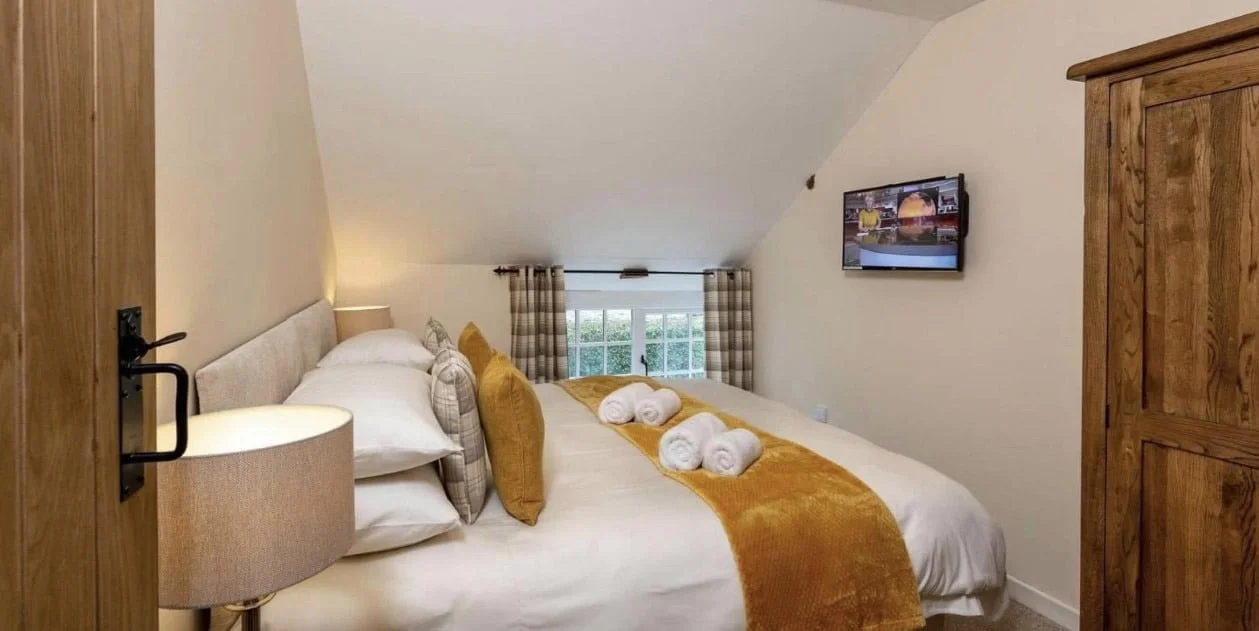 a double bedroom under the eaves at the cottage