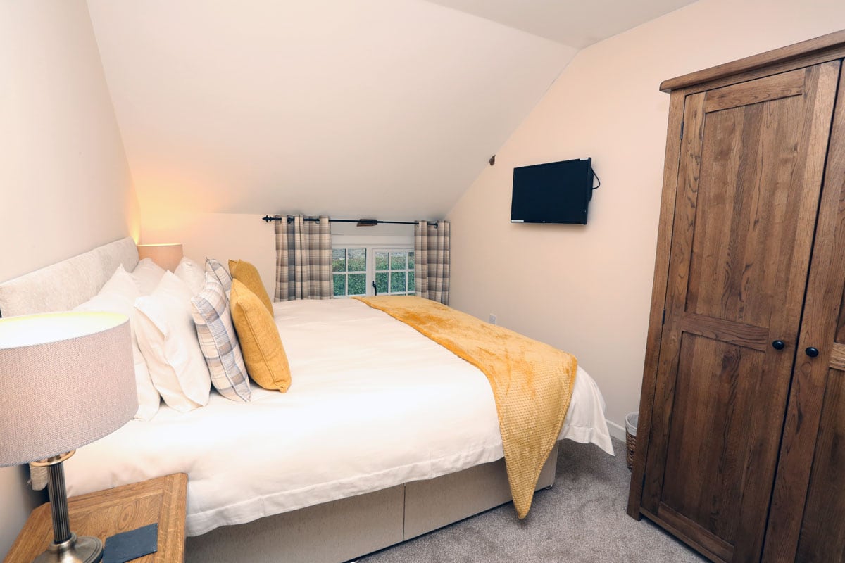 a double bedded room in the cottage