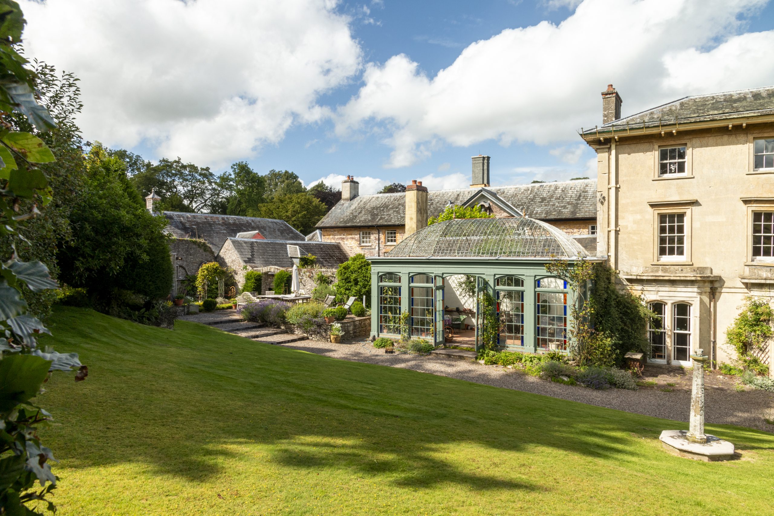 exterior shot of the house and conservatory area