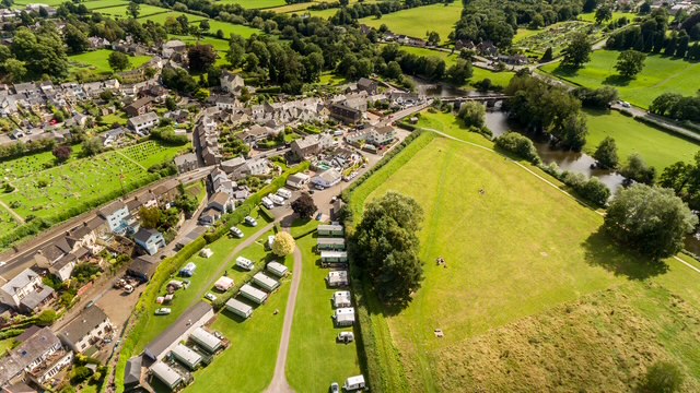 Touring caravans and motorhomes at Riverside Caravan Park, Crickhowell