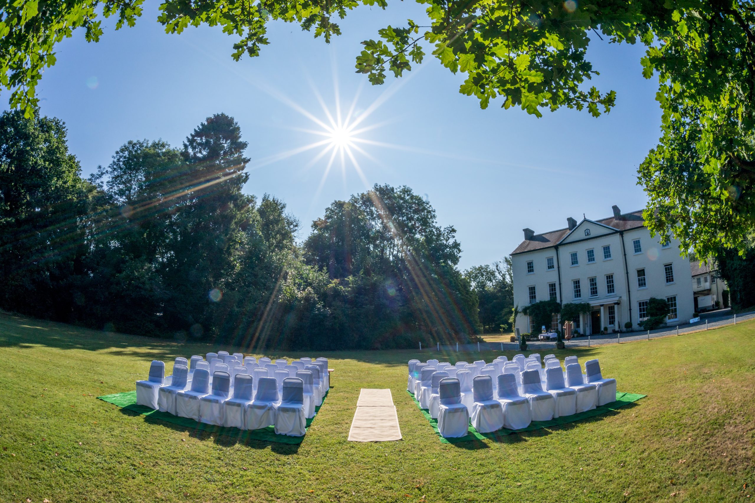 outdoors wedding at the mansion in the garden
