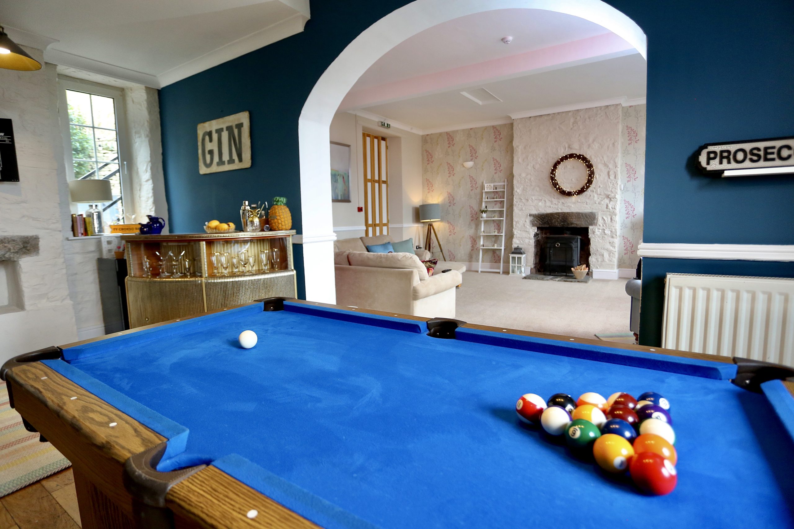 Comfortable shared living space inside Ty Croeso holiday house.