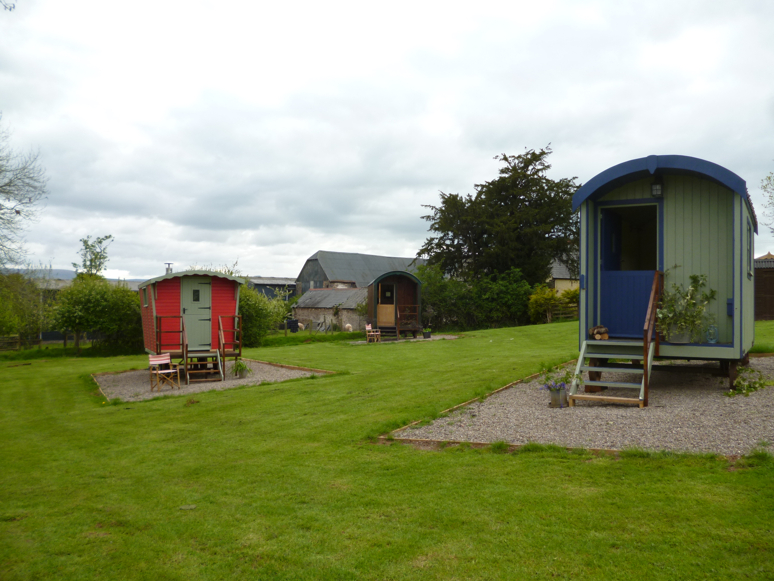 Traditional shepherd’s huts on a working farm in Bannau Brycheiniog.