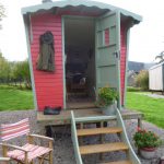 Shepherd’s hut at Shepherds Retreat Wales set within open countryside near Llangorse Lake.